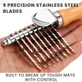 The Flying Pawfect Dematting Rake held in a hand, showing its nine stainless steel blades