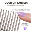 Close up of the Dematting Rake blades with a fingertip on a rounded safety tip, showing the serrated inner edges