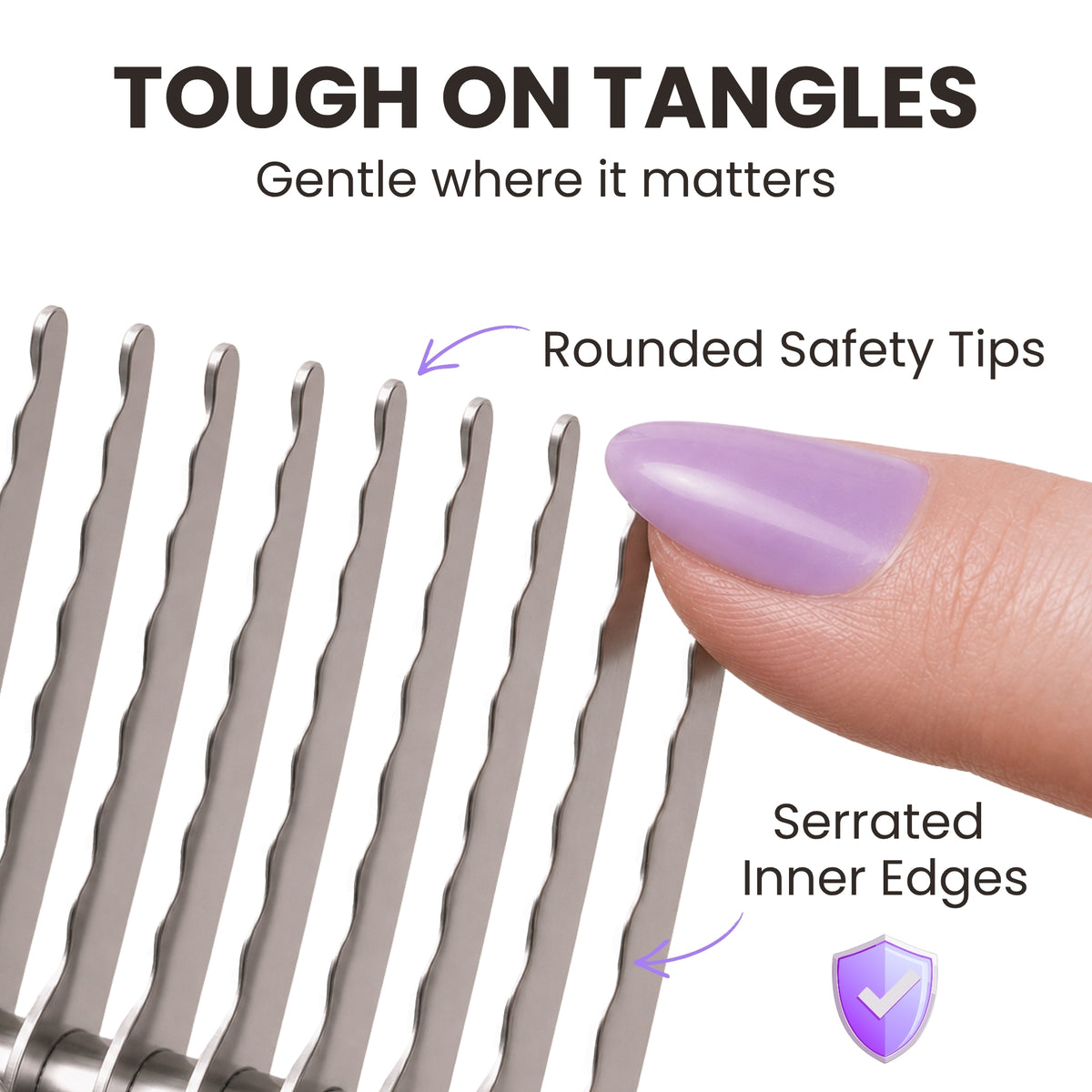 Close up of the Dematting Rake blades with a fingertip on a rounded safety tip, showing the serrated inner edges